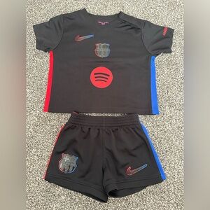 Nike Kids FC Barcelona Black Jersey & Shorts Set with Red and Blue Accents 24/25